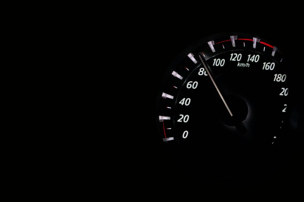 Speedometer reading showing speed in km/h on a dark background.