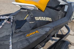 Scarborough Jet Ski Rentals – Sea-Doo Spark at Toronto’s Waterfront Black and yellow Sea-Doo Spark jet ski on trailer beside Lake Ontario in Toronto