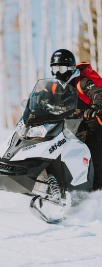 snowmobile rental ontario with a rented skidoo tour in snowy trails